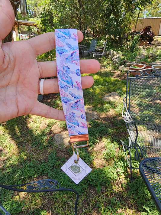 Blue and pink feather wristlet