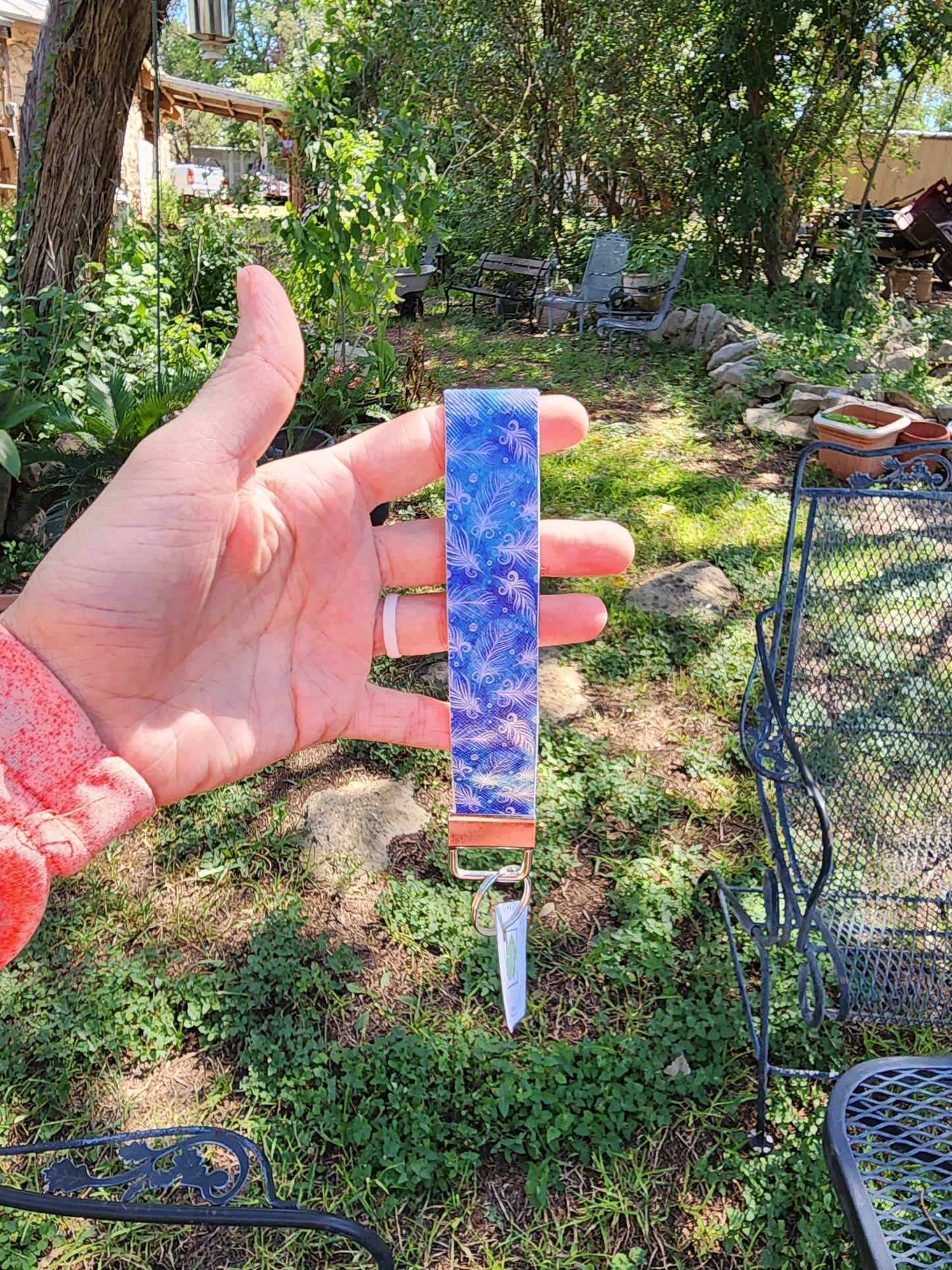 Blue feather wristlet