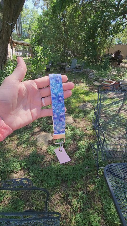 Blue feather wristlet